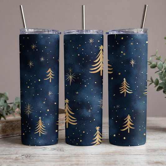 Three tumblers with a dark blue background, gold Christmas trees, and star accents.