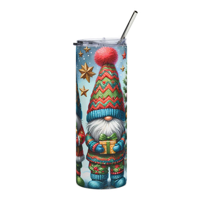 Tumbler with festive gnomes, gifts, stars, and snowflakes on a light blue background.