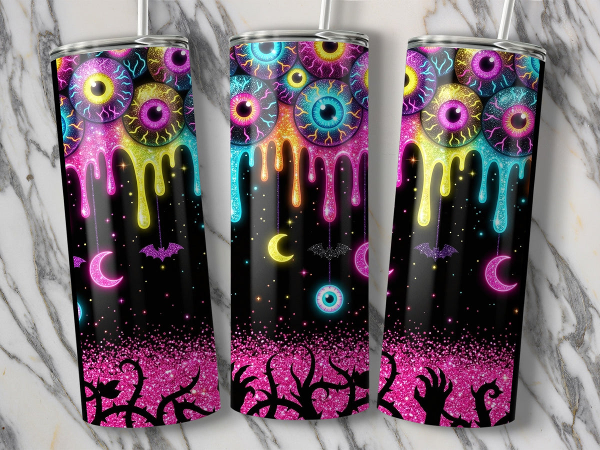 Three tumblers with Halloween eyeballs, dripping glitter, moons, bats, and thorny branches.