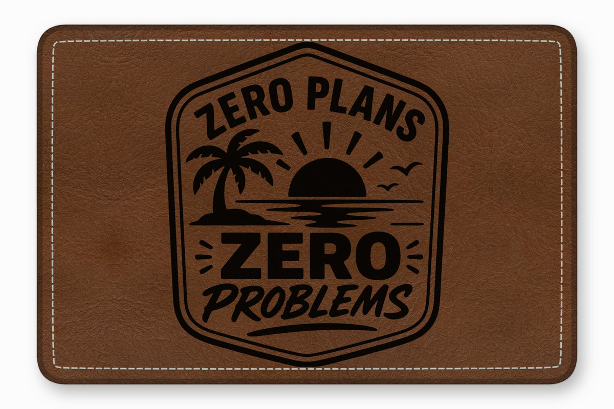 A brown leather patch with white stitched edges featuring an engraved tropical sunset and text reading Zero Plans Zero Problems.
