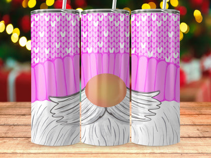 Three tumblers feature a pink knit pattern, gnome face, and white beard on a wooden surface.