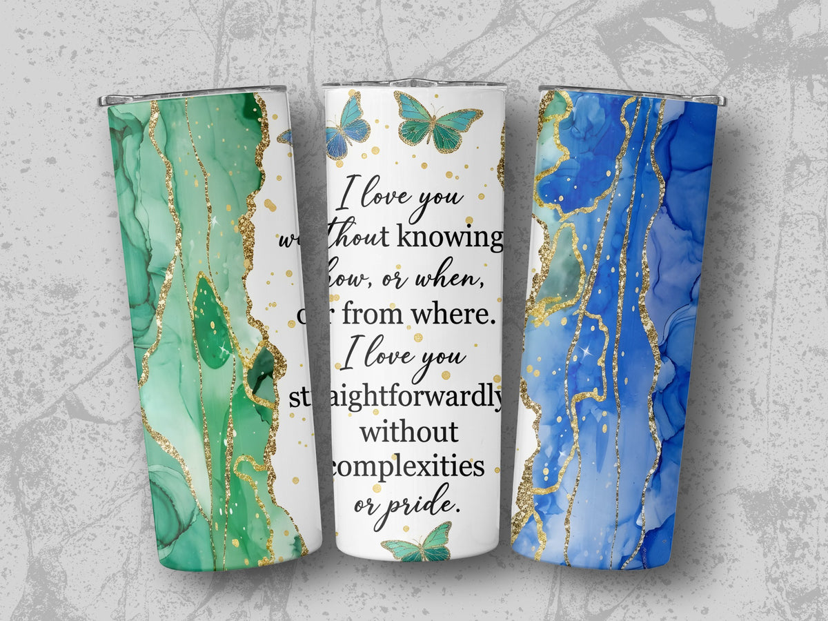 Tumblers with marble-like green and blue designs, gold accents, and text.