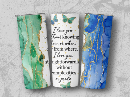 Tumblers with marble-like green and blue designs, gold accents, and text.
