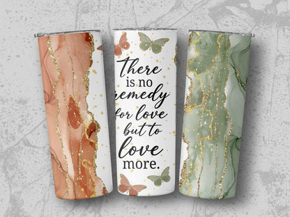 Three tumblers with marble patterns and the quote "There is no remedy for love but to love more."