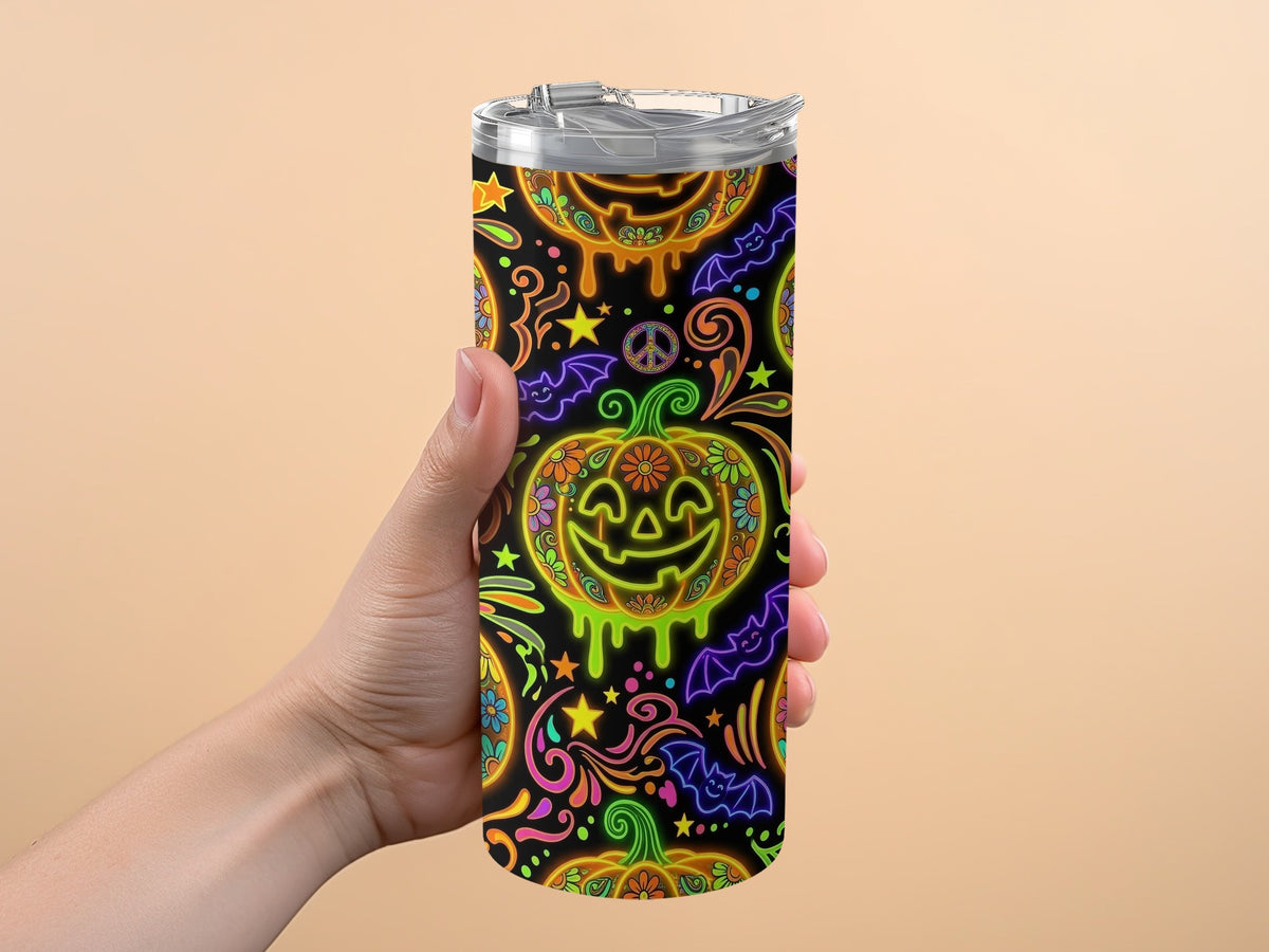 Tumbler with a black background and colorful neon Halloween pattern.