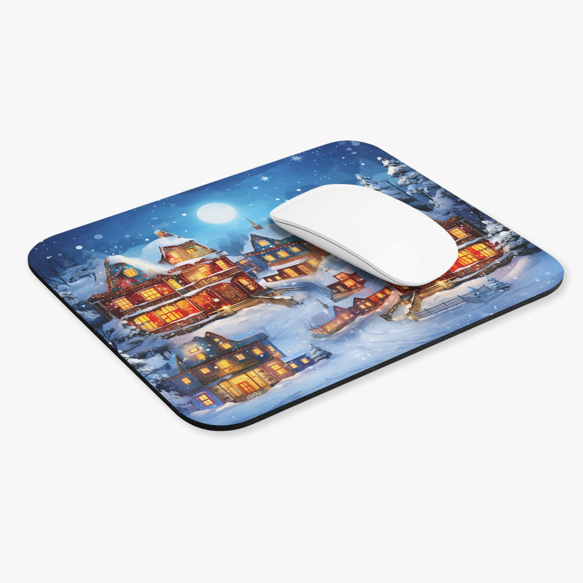 Mousepad with a watercolor painting of a cozy, snow-covered village under a full moon.