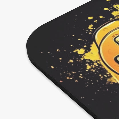 Mousepad with abstract yellow graffiti design on black background.