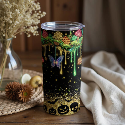 Black tumbler with neon mushrooms, butterfly, snail, bats, pumpkins, and skulls.