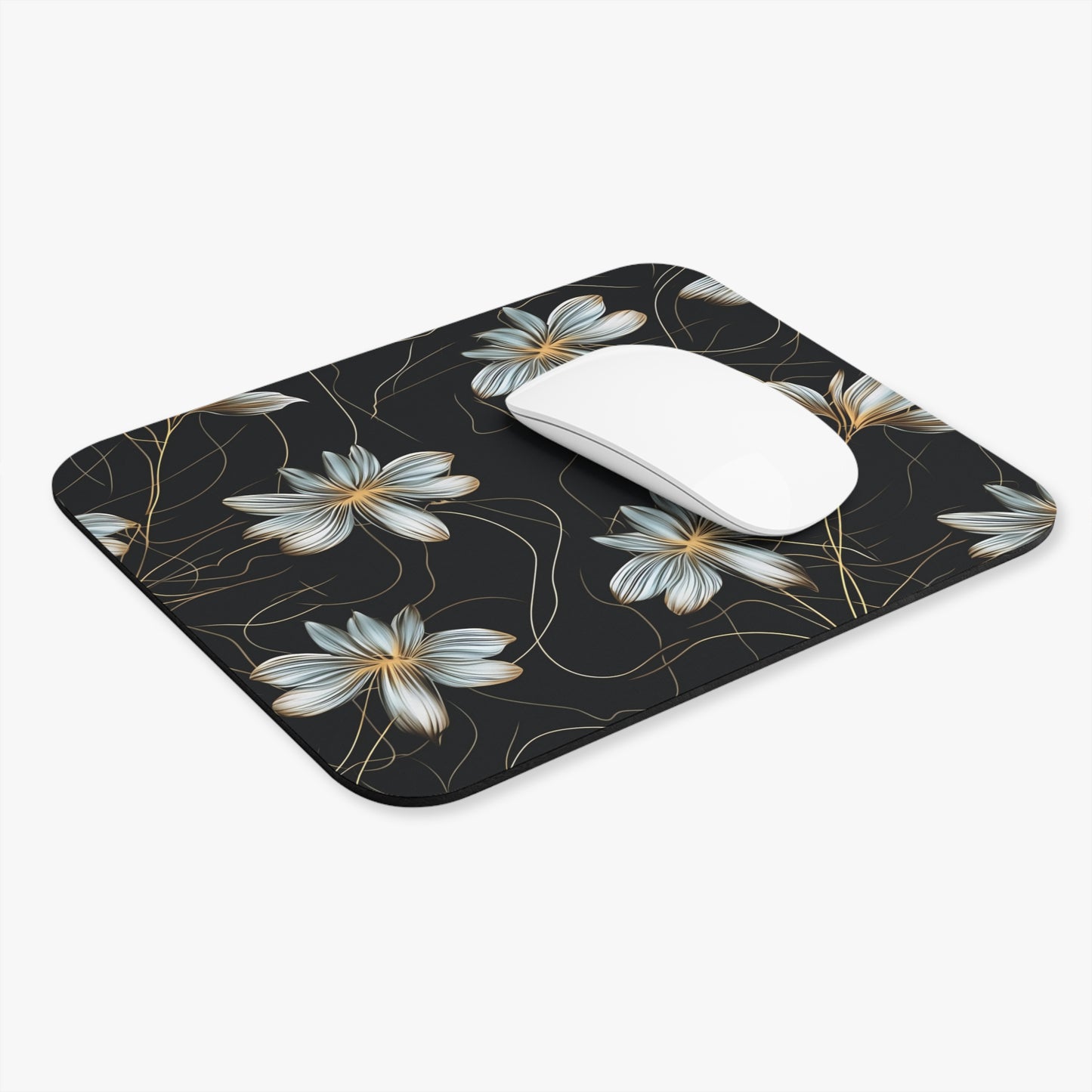 Black mousepad with a floral pattern of white and gold flowers and delicate lines.