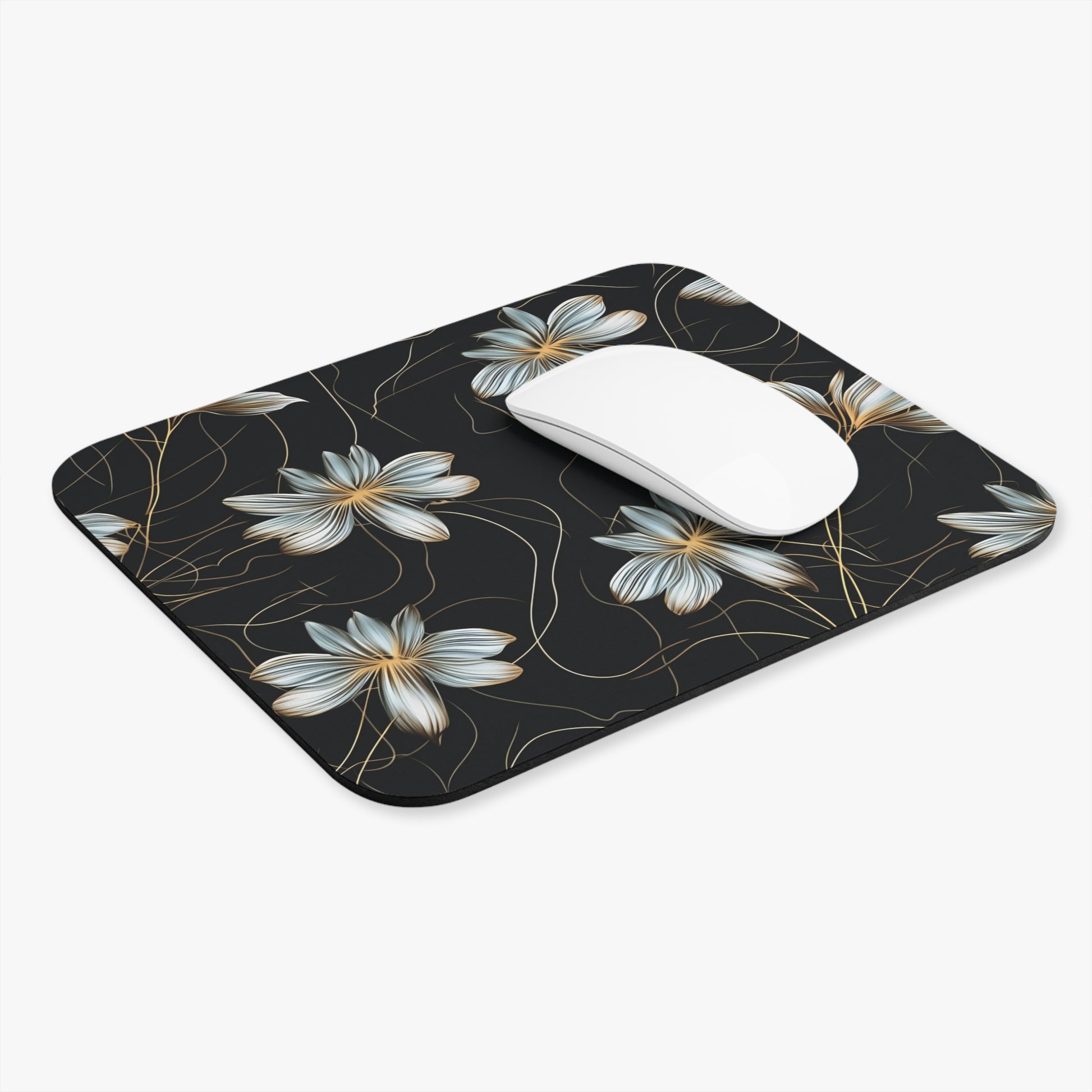 Black mousepad with a floral pattern of white and gold flowers and delicate lines.
