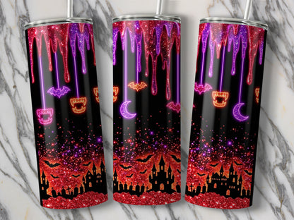 Three tumblers with dripping glitter, bats, fangs, and haunted castles on black.