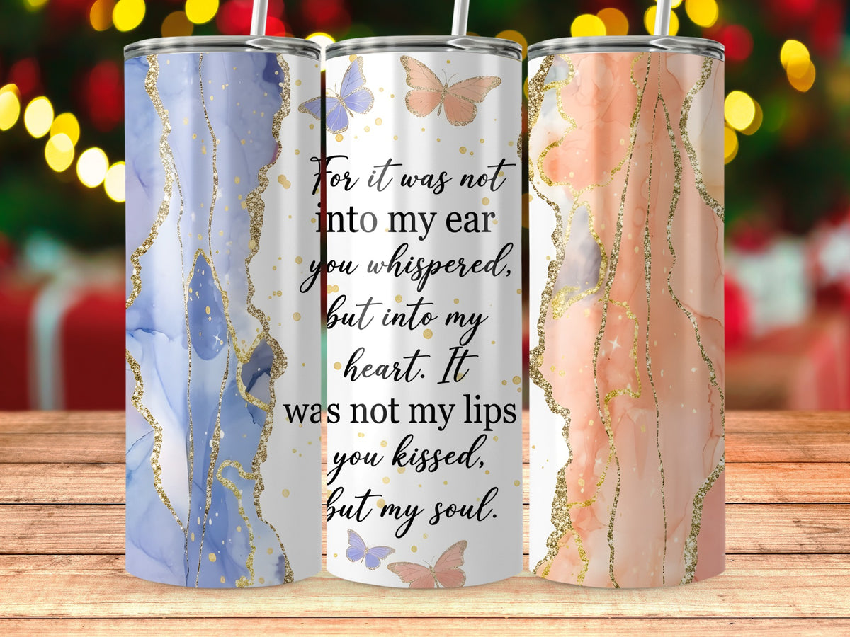 Three tumblers with marble patterns, one displaying text and butterflies.