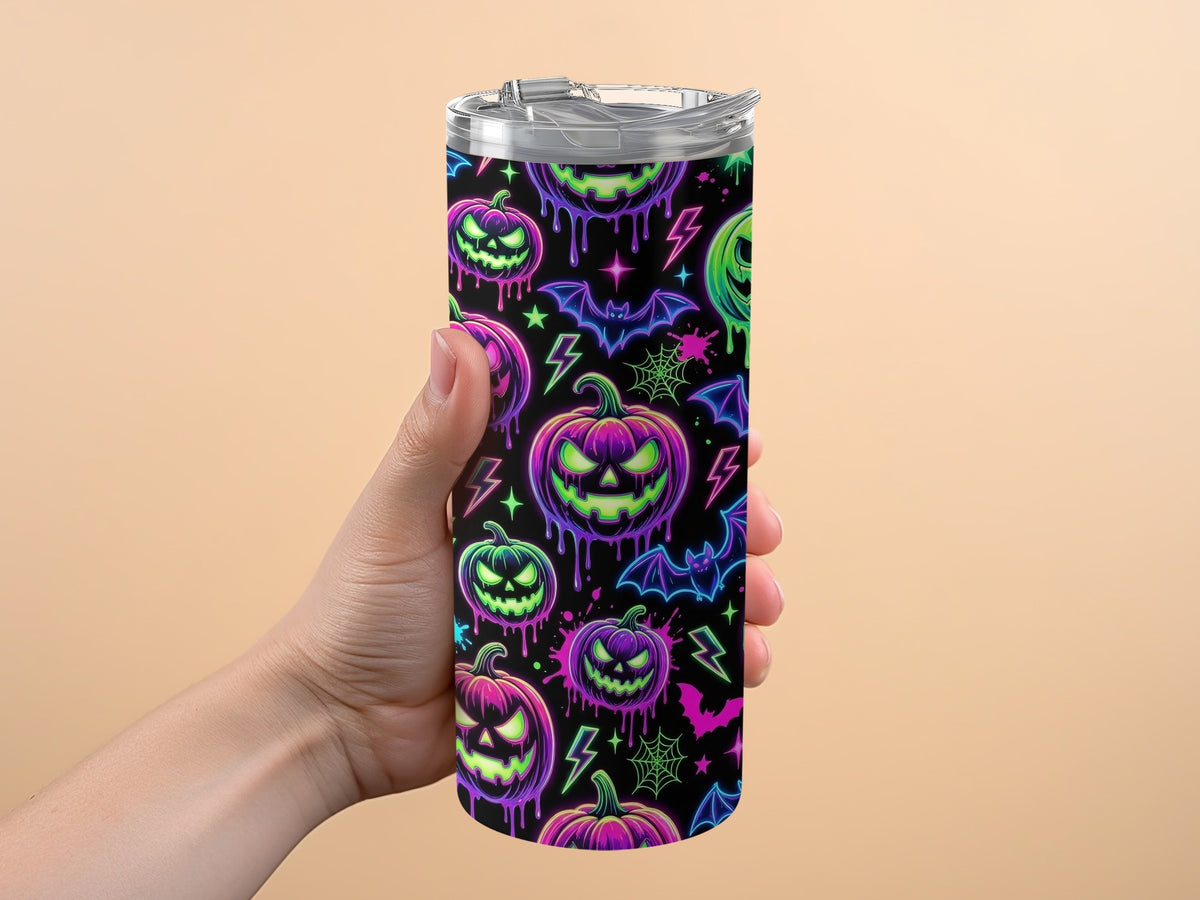 Tumbler with neon Halloween pattern of pumpkins, bats, lightning, and spiders.