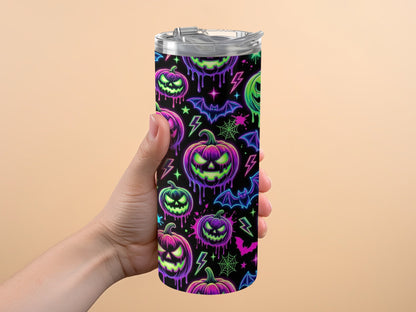 Tumbler with neon Halloween pattern of pumpkins, bats, lightning, and spiders.