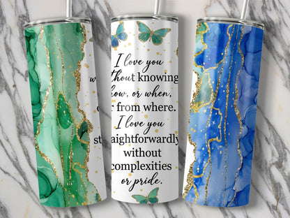 Three tumblers with abstract green, white, and blue marbled designs and gold glitter accents.