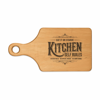 Wooden cutting board with "Eat It or Starve Kitchen Self Ruiles" engraved text.