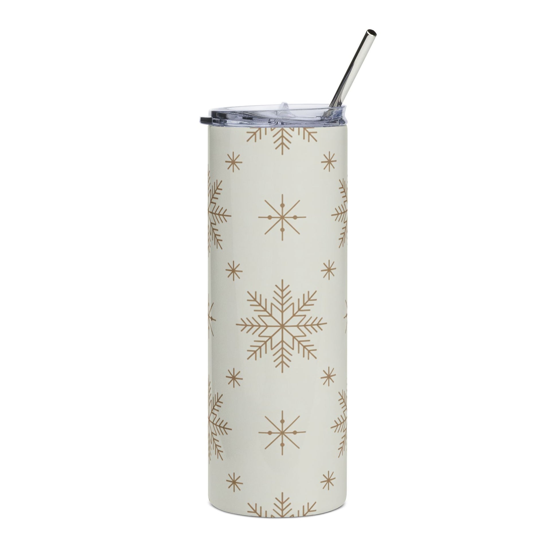 Tall tumbler with snowflake pattern and metal straw.
