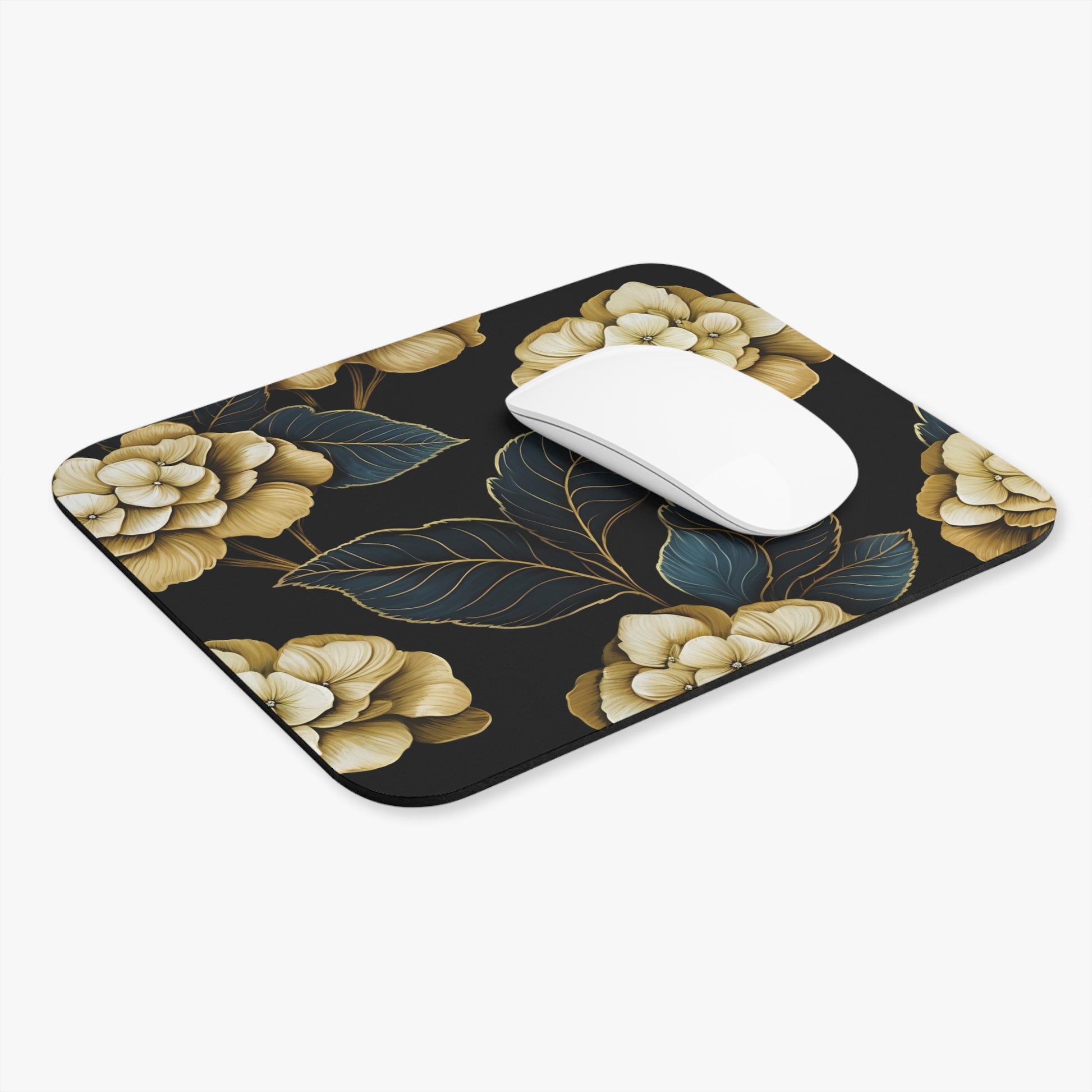 Mousepad with a dark background featuring a golden floral and leaf pattern.