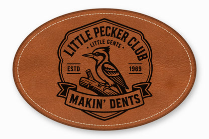 Oval brown leather patch with white stitched border, featuring a woodpecker logo and text reading Little Pecker Club and Makin Dents.