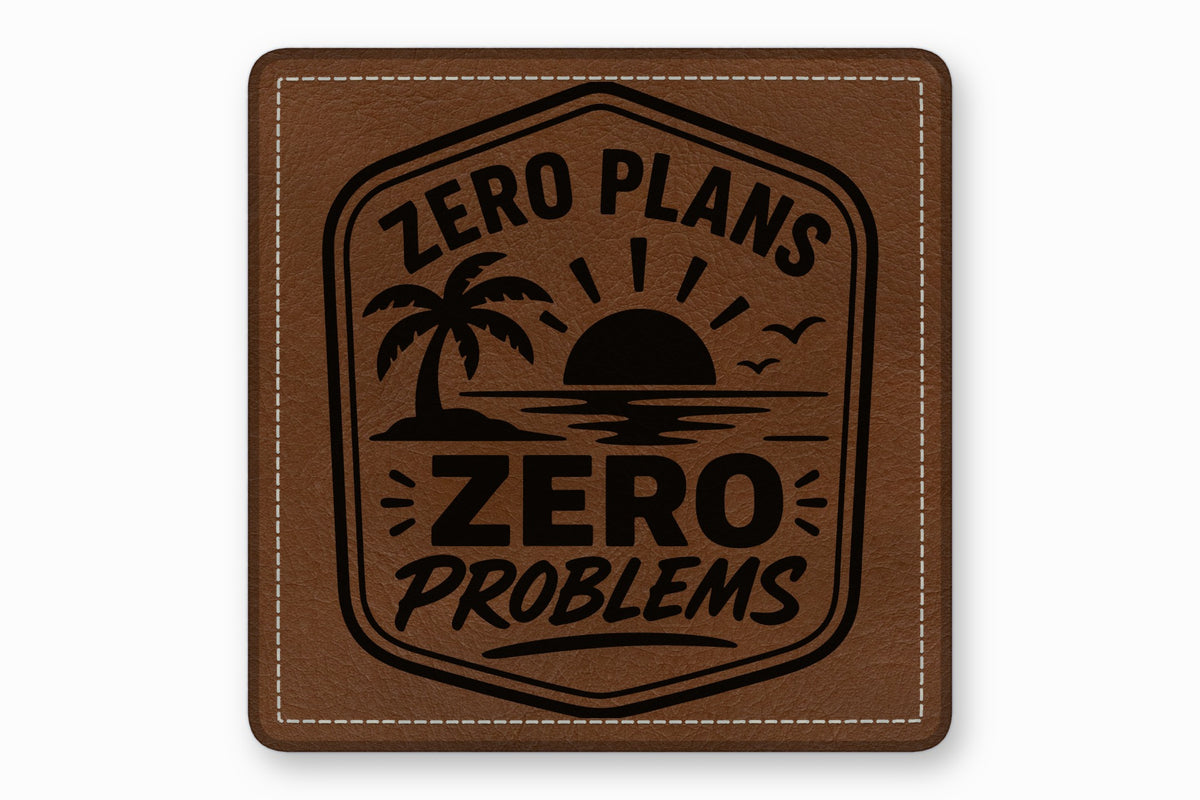 Brown leather patch with rounded corners featuring a stitched border and a black beach scene design.