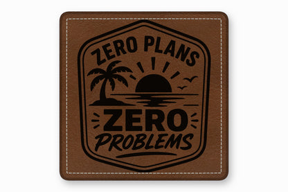 Brown leather patch with rounded corners featuring a stitched border and a black beach scene design.