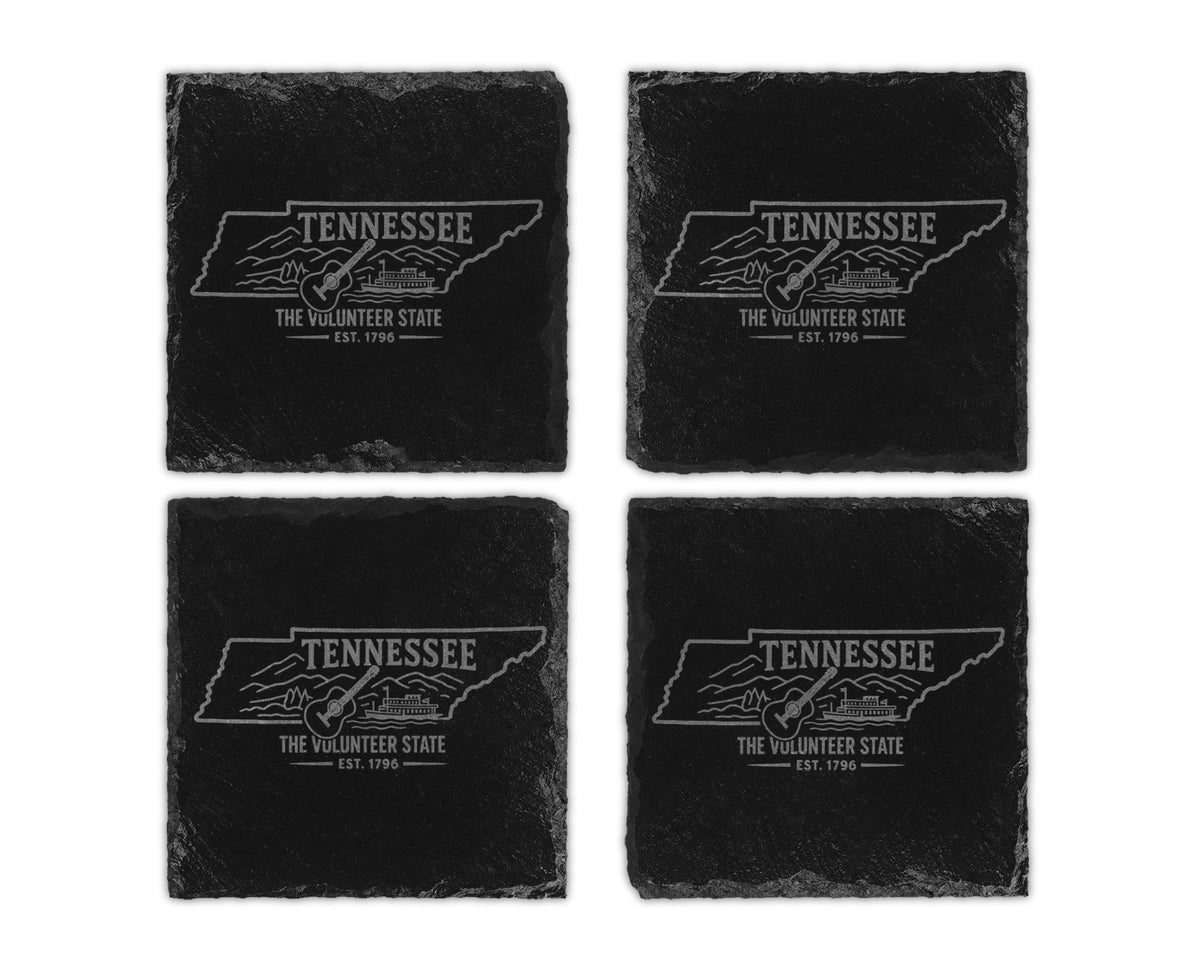 Four black slate coasters featuring Tennessee outline with guitar and steamboat graphic.