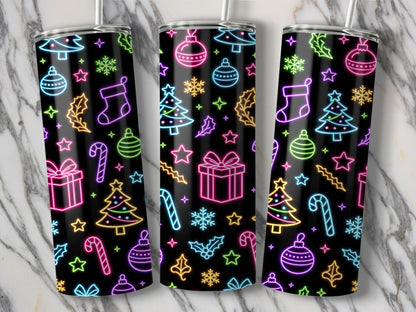 Three tumblers with a black background and a neon Christmas pattern.