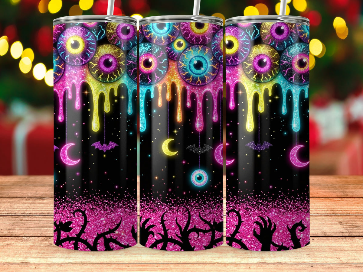 Tumbler with dripping eyeballs, moons, bats, and thorny vines on a black glitter background.