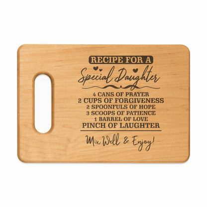 Wooden cutting board with "Recipe for a Special Daughter" text and ingredients.