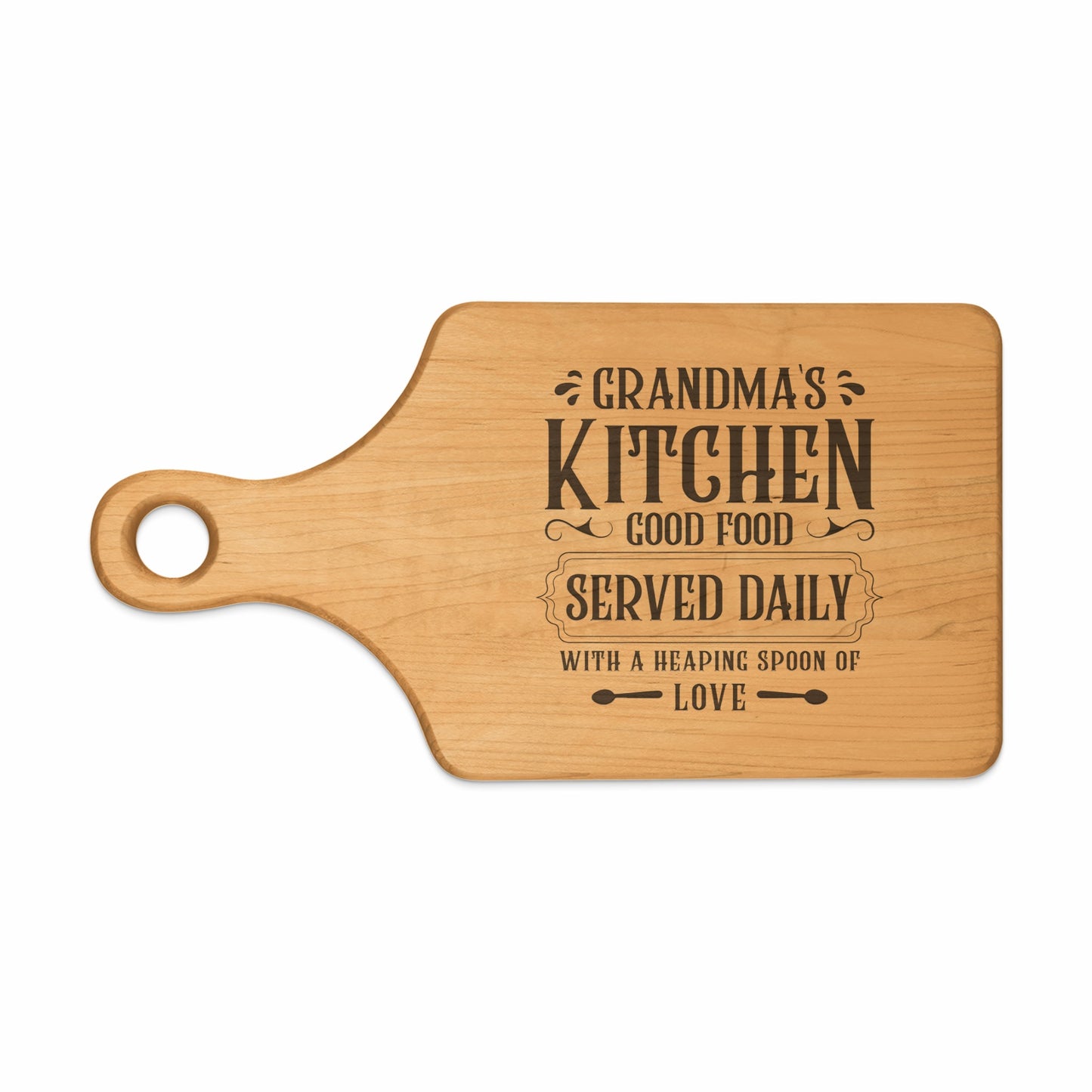 Wooden cutting board with "Grandma's Kitchen Good Food Served Daily With A Heaping Spoon Of Love" text.
