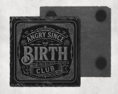 Slate coaster with text "Angry Since Birth Club" and decorative elements.
