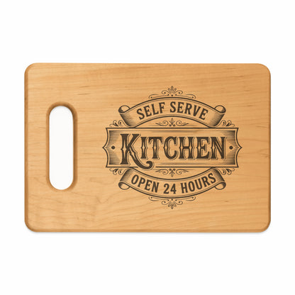 Wooden cutting board with "Self Serve Kitchen Open 24 Hours" engraved.