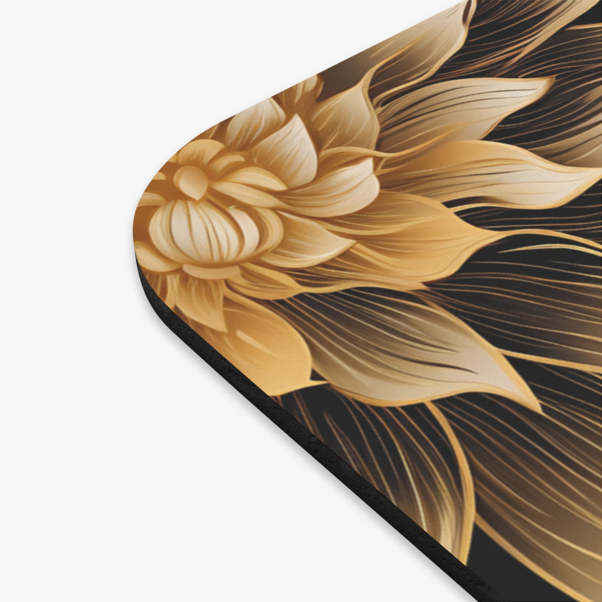 Gold floral pattern with swirling lines on a black background.