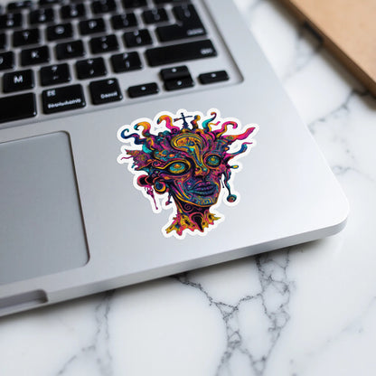 Psychedelic abstract face sticker with colorful tentacles on a laptop.