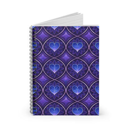 Spiral bound journal with purple and blue heart and floral pattern.
