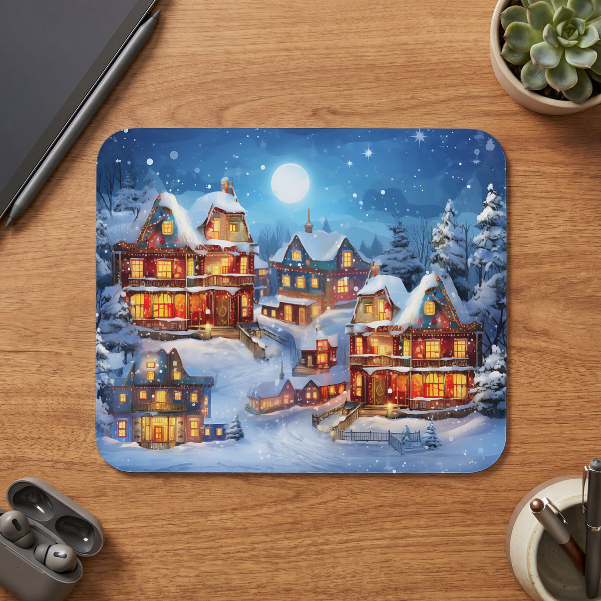 Snowy village scene with illuminated houses under a full moon and starry sky.