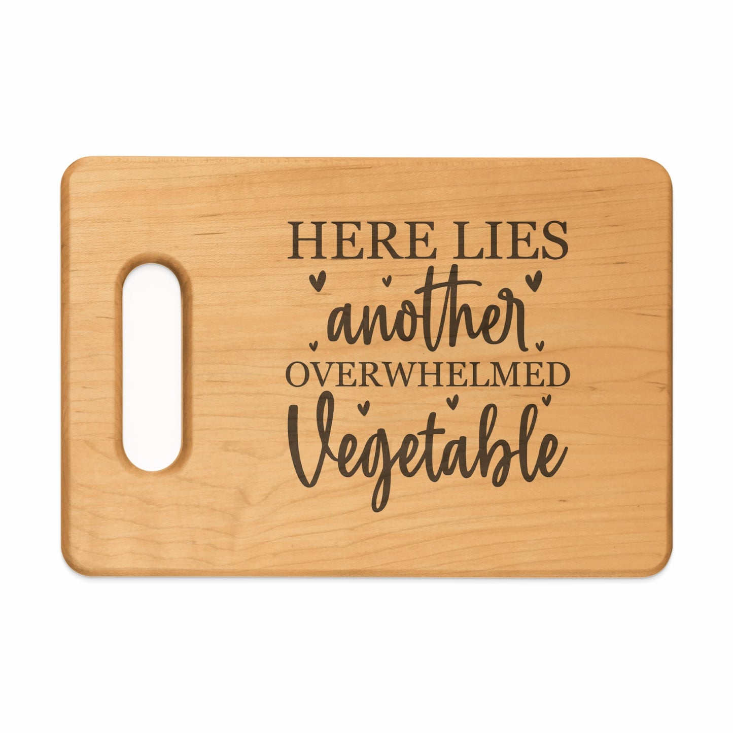 Wooden cutting board with engraved text: HERE LIES another OVERWHELMED Vegetable