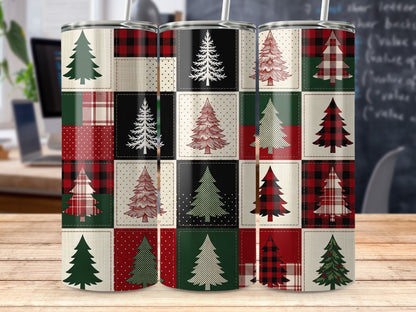 Tumbling cups with a patchwork design of Christmas trees and plaid patterns.