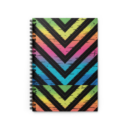 Spiral-bound notebook with rainbow chevron pattern and distressed texture.