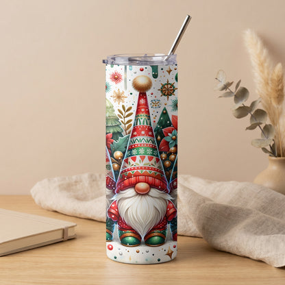 Tall tumbler with a Christmas gnome design featuring snowflakes, trees, and ornaments.