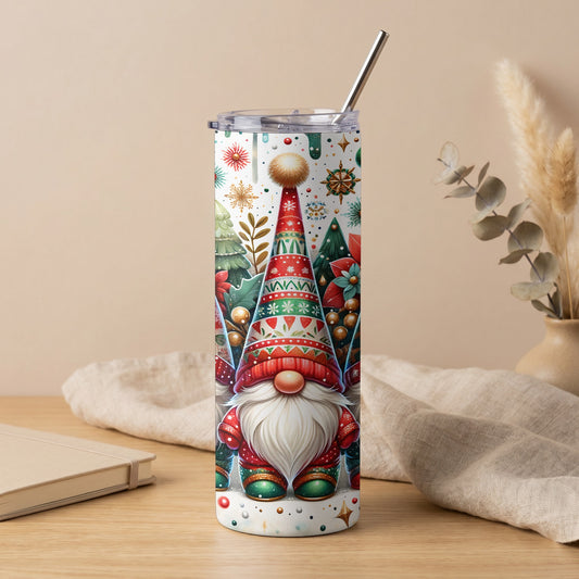 Tall tumbler with a Christmas gnome design featuring snowflakes, trees, and ornaments.