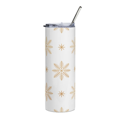 White tumbler with gold snowflake pattern and stainless steel straw.
