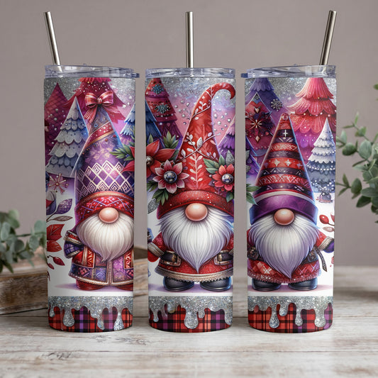 Three skinny tumblers featuring gnomes and festive trees with glitter accents.