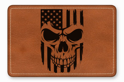 Brown leather patch with rounded corners featuring a black engraved skull and American flag design.