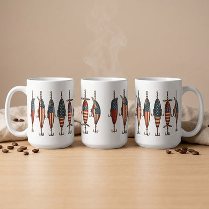 Three white mugs displayed with fishing lures featuring American flag patterns.