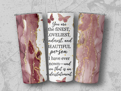 Tumbler with marble design, gold glitter, and inspirational quote about a beautiful person.