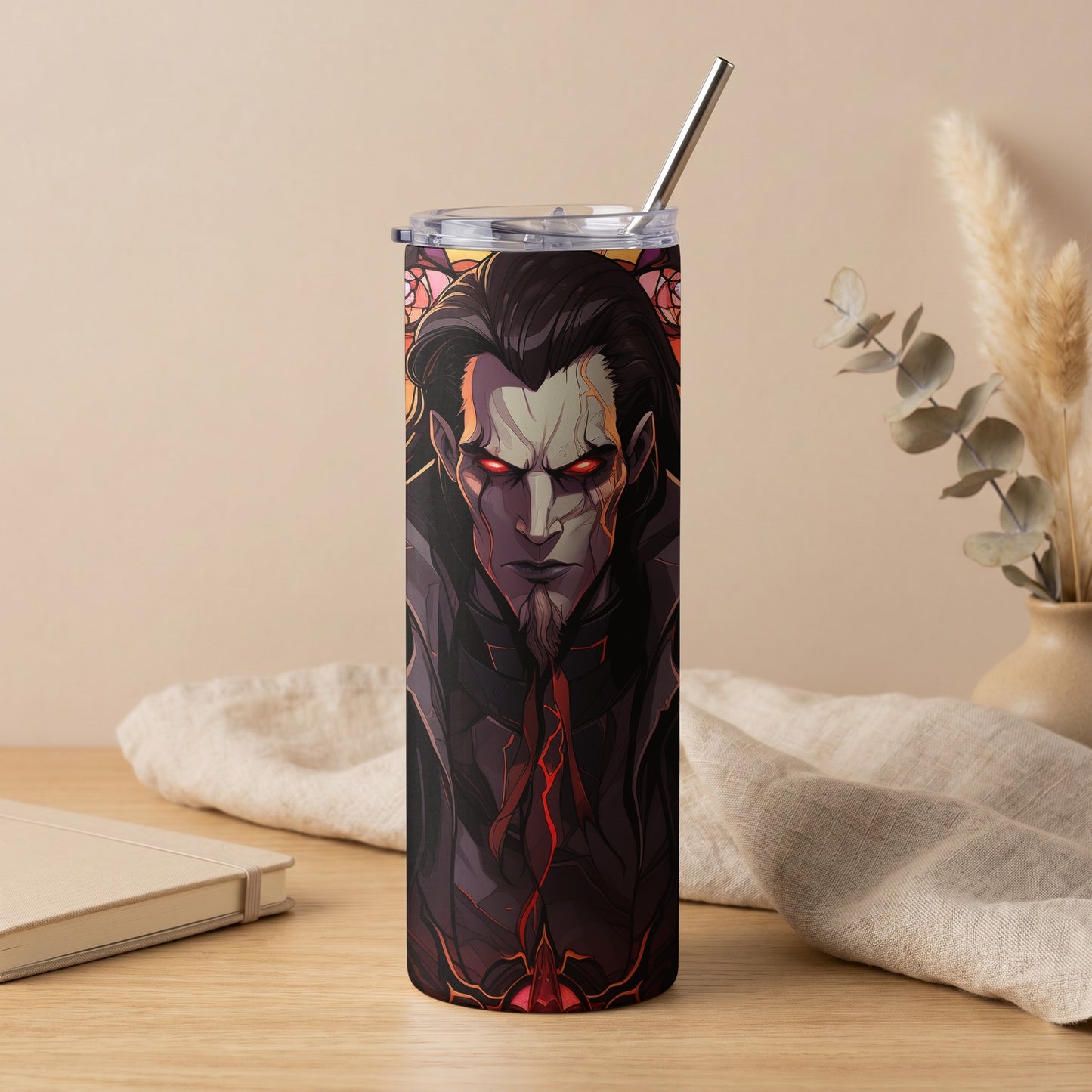 Tall tumbler with a dark fantasy character design and a stainless steel straw.