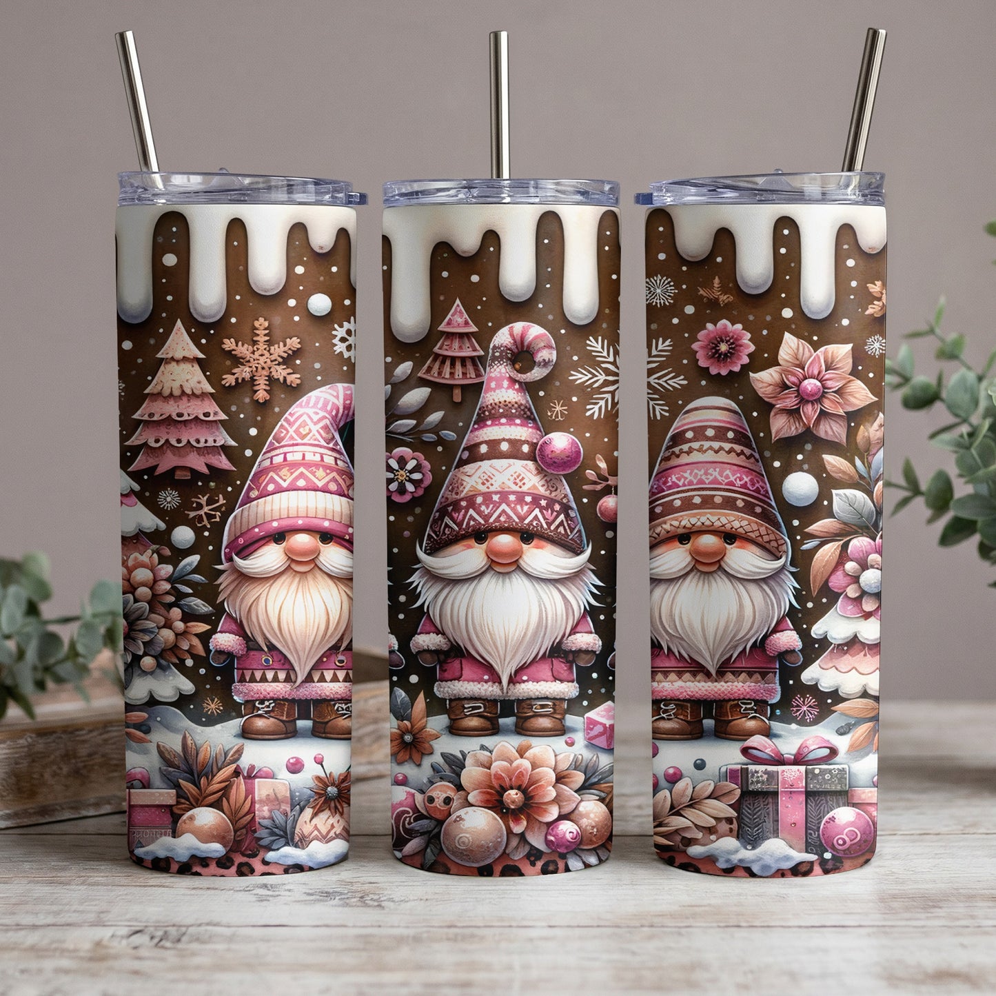 Three tumblers with a Christmas gnome and gingerbread house design.