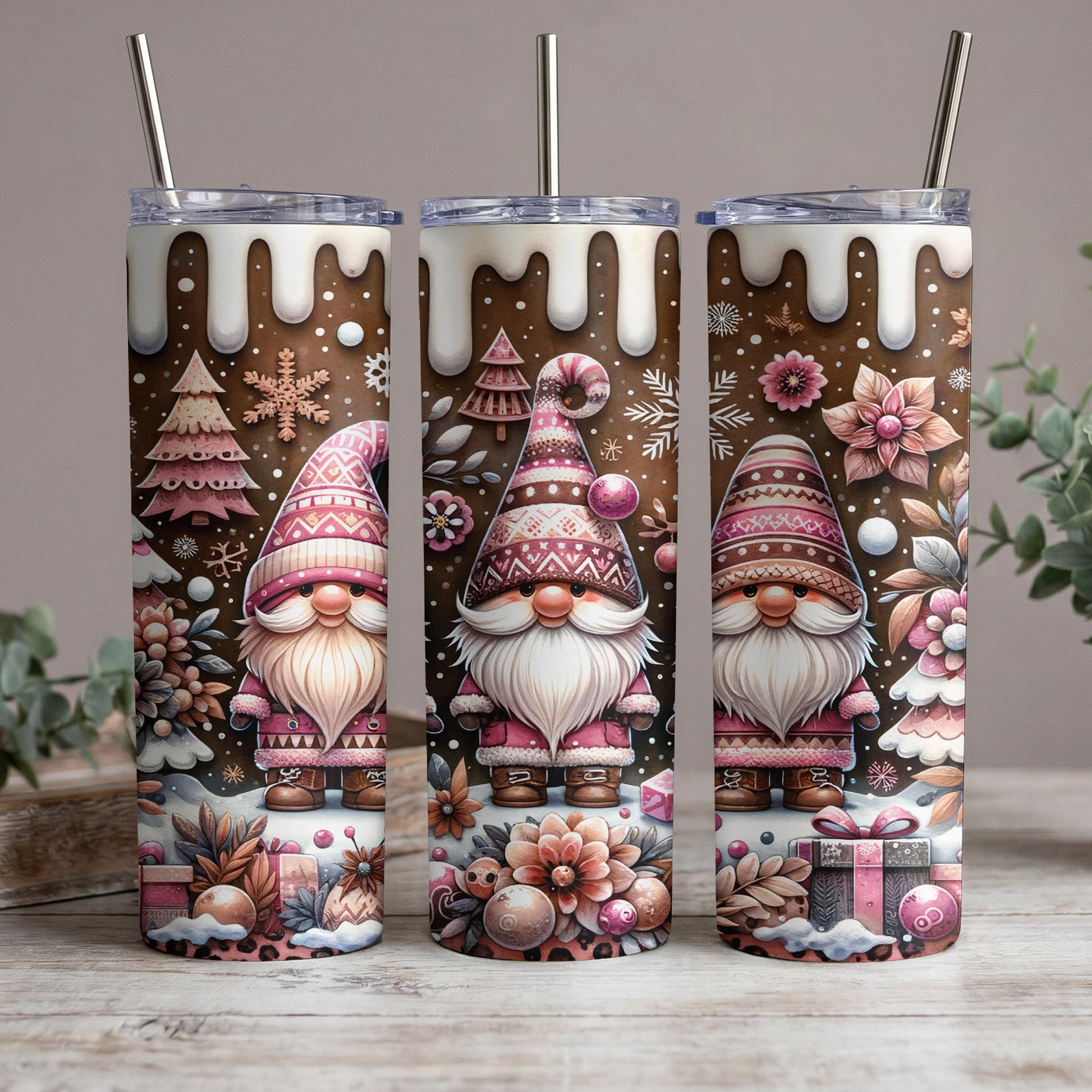 Three tumblers with a Christmas gnome and gingerbread house design.