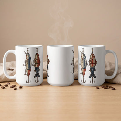 White mugs with patriotic fishing lure designs and steaming coffee.